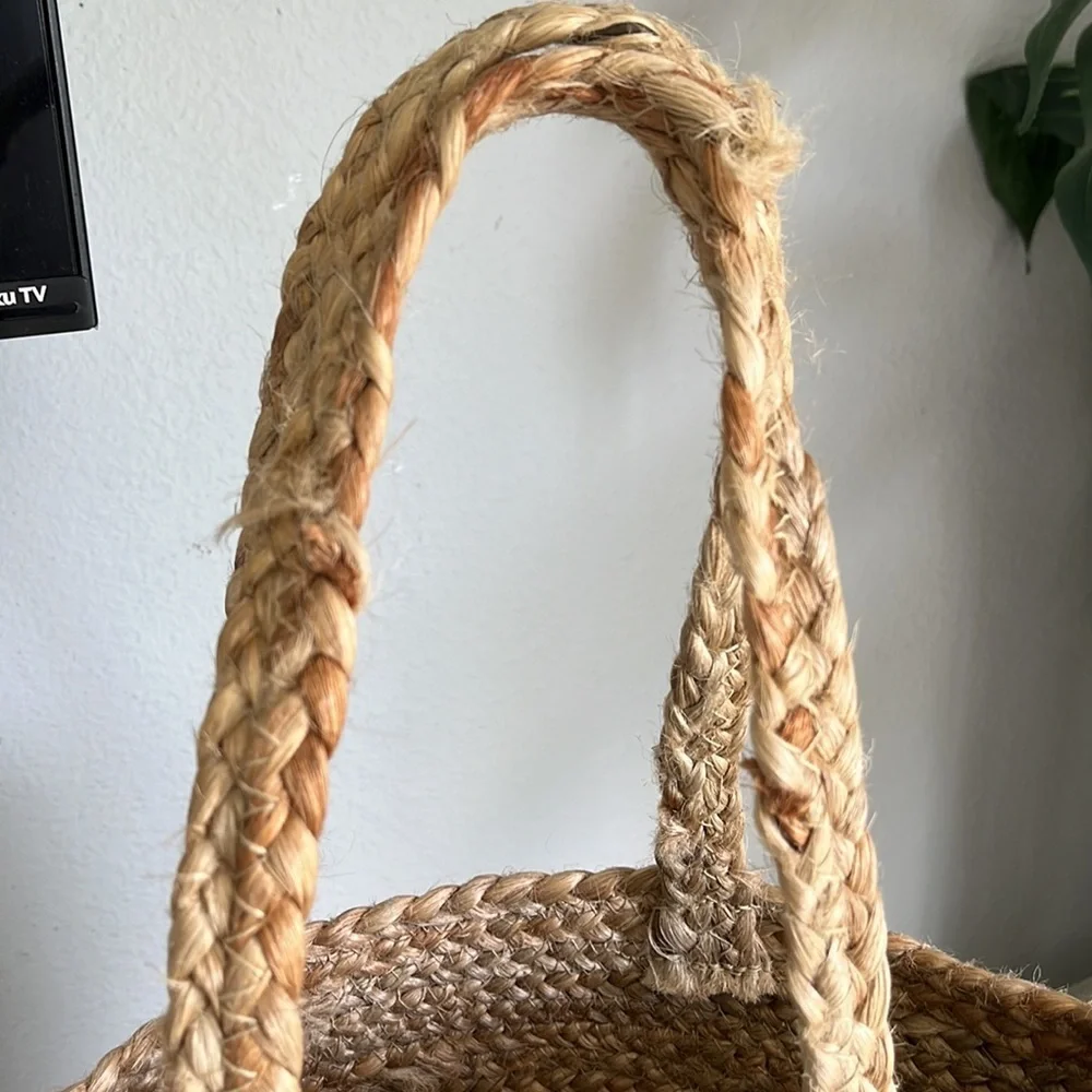- Anthropologie Jute Braided Tote bag with  Pom Pom